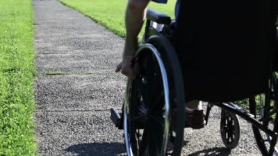 wheel-chair-on-sidewalk