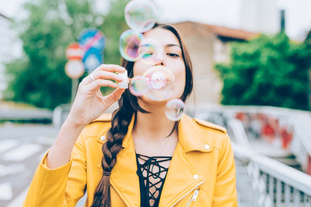 woman-playing-with-bubbles